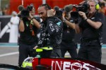 ABU DHABI, UNITED ARAB EMIRATES - DECEMBER 08: 4th placed Lewis Hamilton of Great Britain and Mercedes looks on after performing donuts on track for his final race with Mercedes during the F1 Grand Prix of Abu Dhabi at Yas Marina Circuit on December 08, 2024 in Abu Dhabi, United Arab Emirates. (Photo by Joe Portlock/Getty Images)