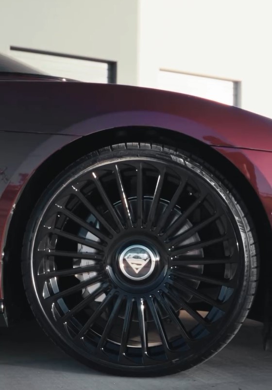 The rims feature a Superman logo