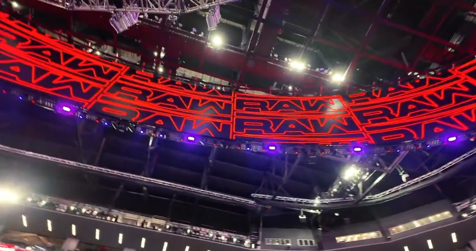 The Raw logo dominates the top of the arena
