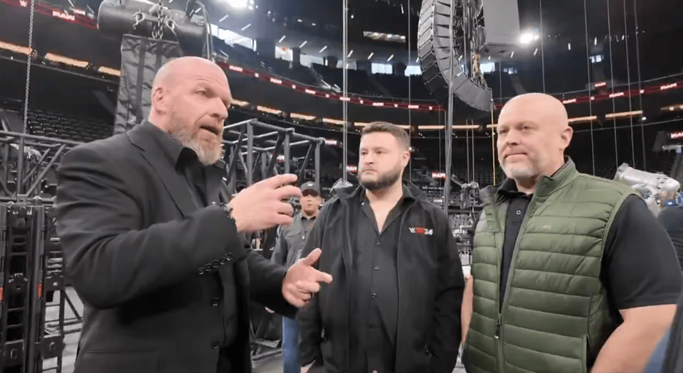 Triple H (left) is established as one of WWE's top executives after a stellar in-ring career